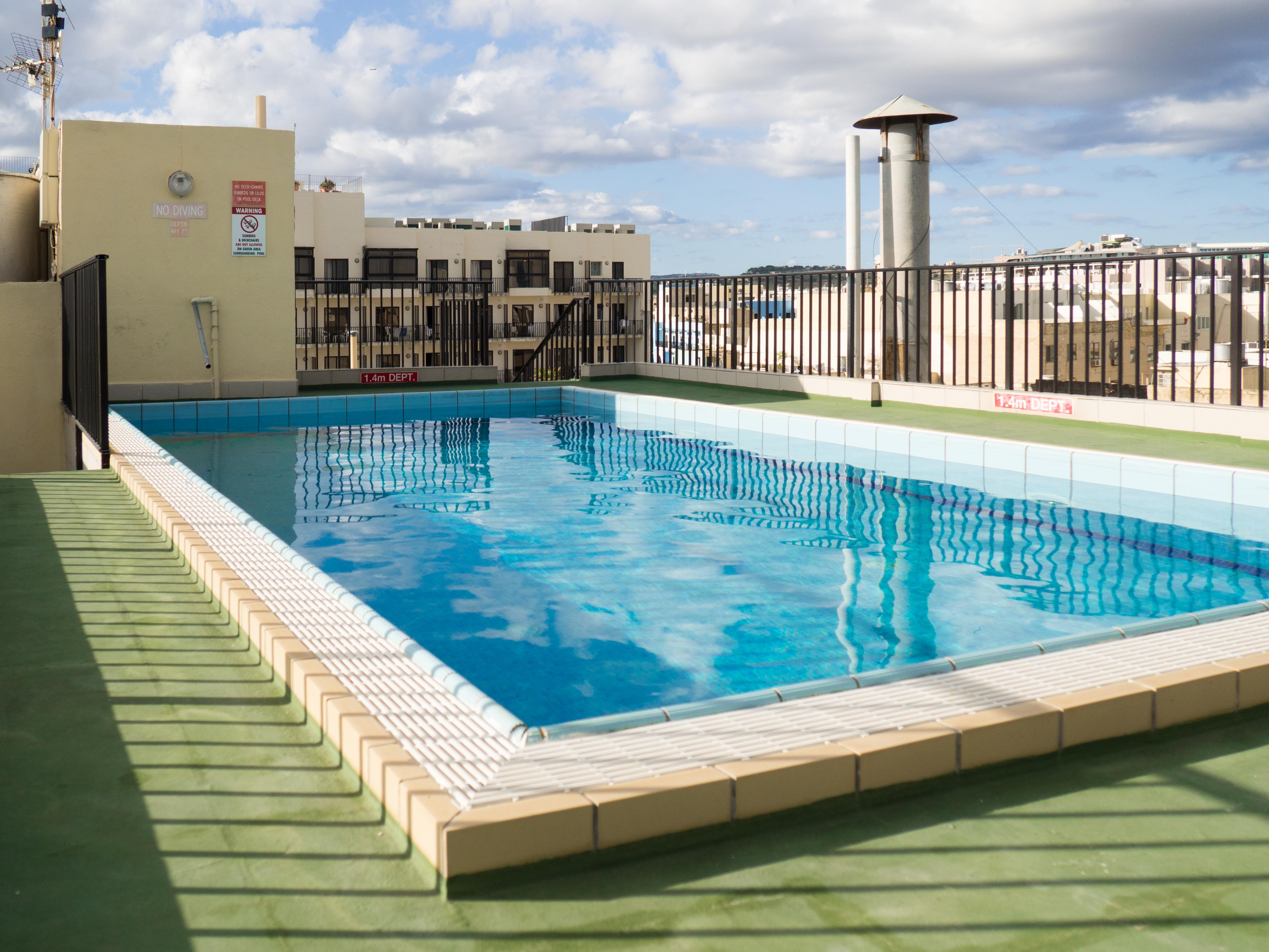 Huli Hotel&Apartments Qawra Buitenkant foto
