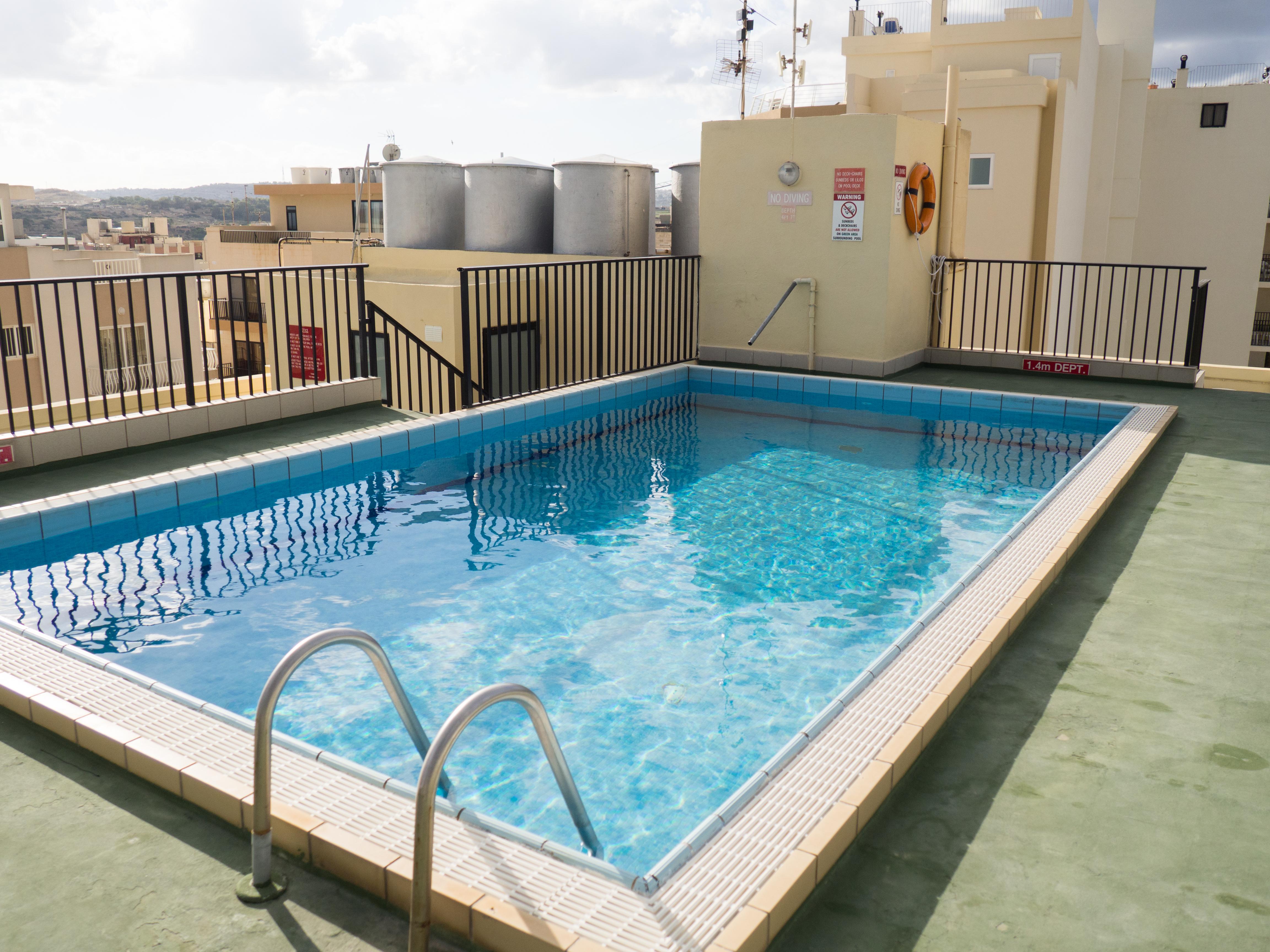 Huli Hotel&Apartments Qawra Buitenkant foto