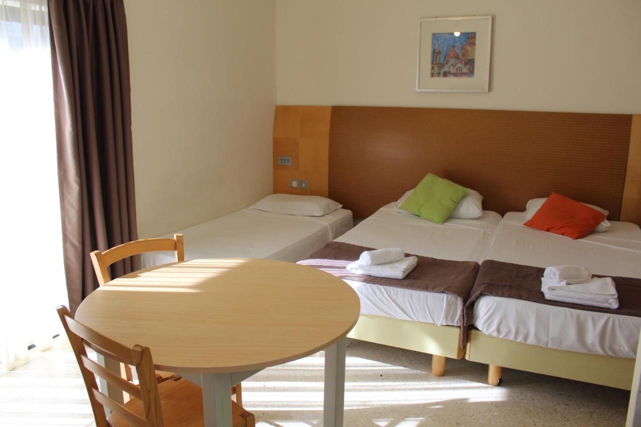 Huli Hotel&Apartments Qawra Buitenkant foto