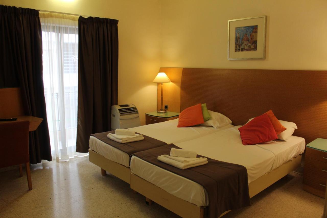 Huli Hotel&Apartments Qawra Buitenkant foto