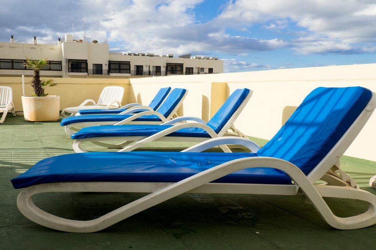 Huli Hotel&Apartments Qawra Buitenkant foto